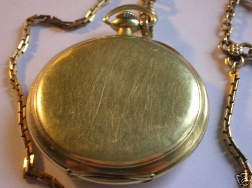 IL Gr 416 Back of 14kt Solidarity Green gold case